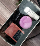 Cranberry coven gift box, white box with  clear lid.  Contains soap, bath bomb, lotion and lip balm.