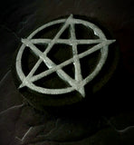 Black pentacle bath bomb with silver accent.