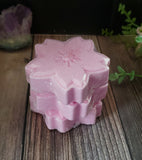 Pink cherry blossom shaped bath fizzy with eco glitter on top.