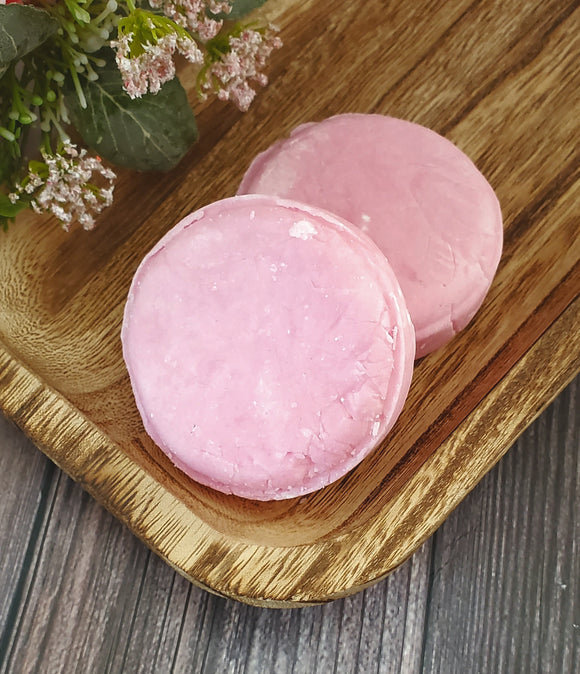 Pink shampoo bar scented in black raspberry vanilla