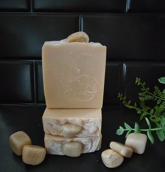 Peach colors soap with a genuine peach moonstone set on the top