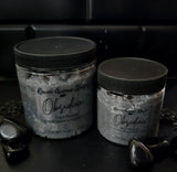 Dark grey sugar scrub with a genuine black obsidian crystal on top