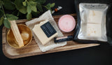 Summer Solstice Celebration Box includes calendula infused soap, sisal soap bag. Celestial citrus shower steamers, strawberry maxi tealight, honey lip balm, palo santo stick, citrine tumble & gold altar bowl