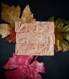 Pumpkin infused artisan soap, orange swirl soap bar with swirled glittery top