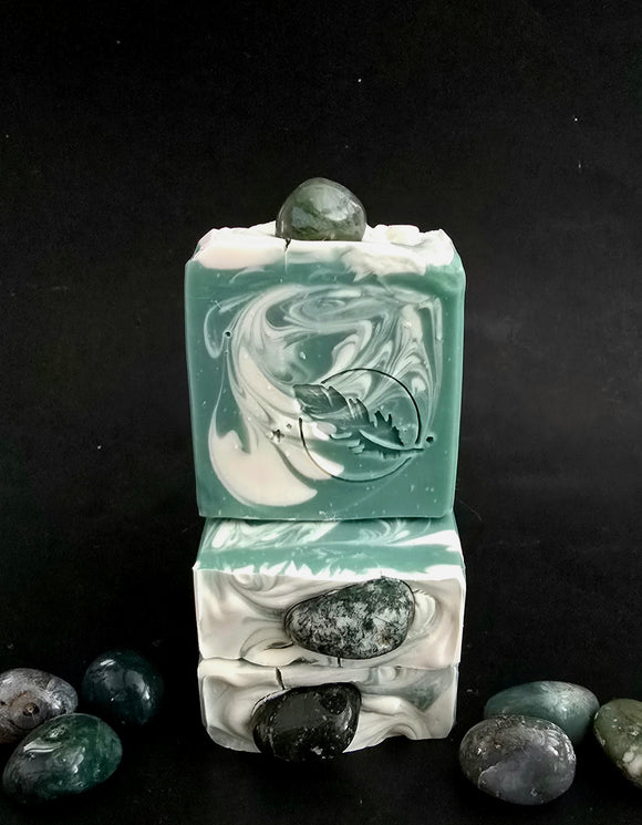 Green and white swirled soap topped with a genuine moss agate tumble.