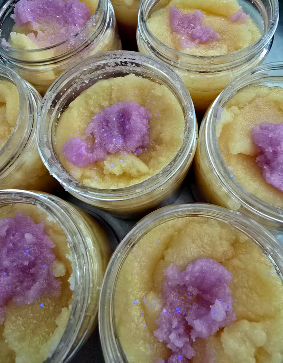 Sunset inspired, colored sugar scrub with ecoglitter on top.