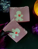 Feelin' Hexy Artisan soap. Purple soap with white doll shape in the middle and soap heart