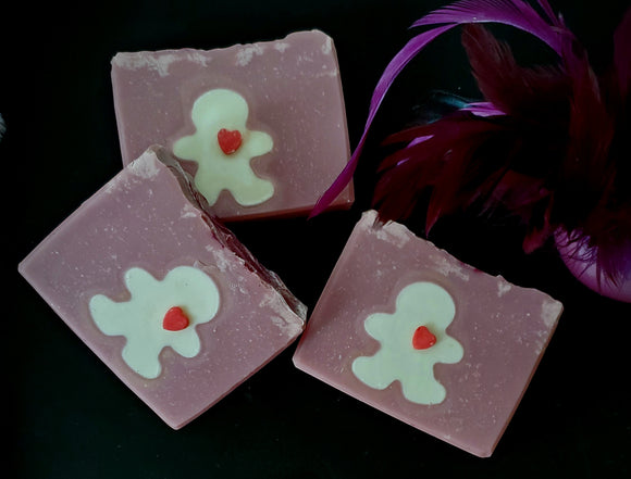 Feelin' Hexy Artisan soap. Purple soap with white doll shape in the middle and soap heart