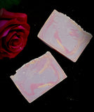 Wanderlust Artisan soap. Purple, gold and pink swirled soap