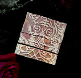 Wanderlust Artisan soap. Purple, gold and pink swirled soap