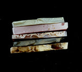 Variety of soap bar samples.