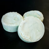 Luffa Lux Soap Bar. Blue soap with luffa slice inside.
