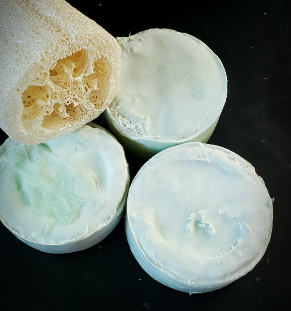 Luffa Lux Soap Bar. Blue soap with luffa slice inside.