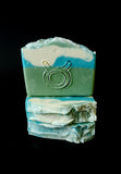 Taurus Astrology Soap. Green, blue and white striped soap with taurus astrology symbol stamped on front