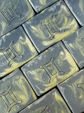 Gemini astrology soap. In gray and yellow swirl with gemini symbol stamped on front