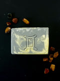 Gemini astrology soap. In gray and yellow swirl with gemini symbol stamped on front