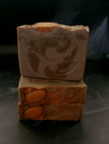 Enchanted Pumpkin artisan soap. Light brown swirled soap with soap pumpkin on top