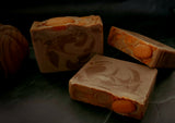 Enchanted Pumpkin artisan soap. Light brown swirled soap with soap pumpkin on top