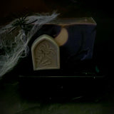 Graveyard artisan soap. Purple and black soap with white crescent moon embed and soap gravestone on the front