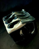 The Raven artisan soap. Black soap with white swirl and black soap raven skull on top