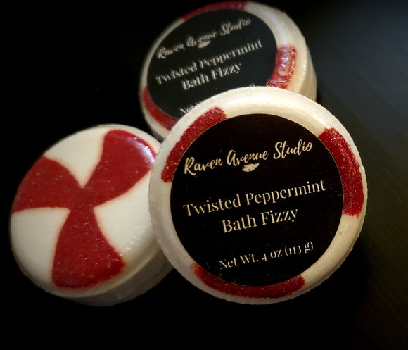 Red and white bath fizzy scented in sweet peppermint