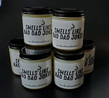 Candles that say "Smells like Bad Dad Jokes" on the label
