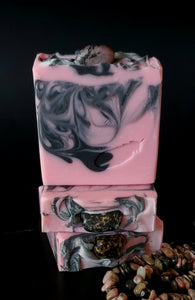 Pink and black soap with genuine rhodonite crystal