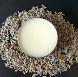 Tattoo balm in  in black tin on lavender buds