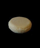 Solid shampoo bar in light orange