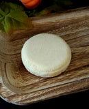 Solid shampoo bar in light orange