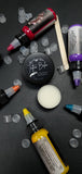Tattoo balm in  in black tin 1 oz and 1/2 oz size