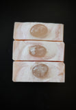 Pink and white swirled soap with genuine flower agate  crystal on top