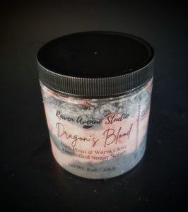 Black and red sugar scrub in dragon's blood scent