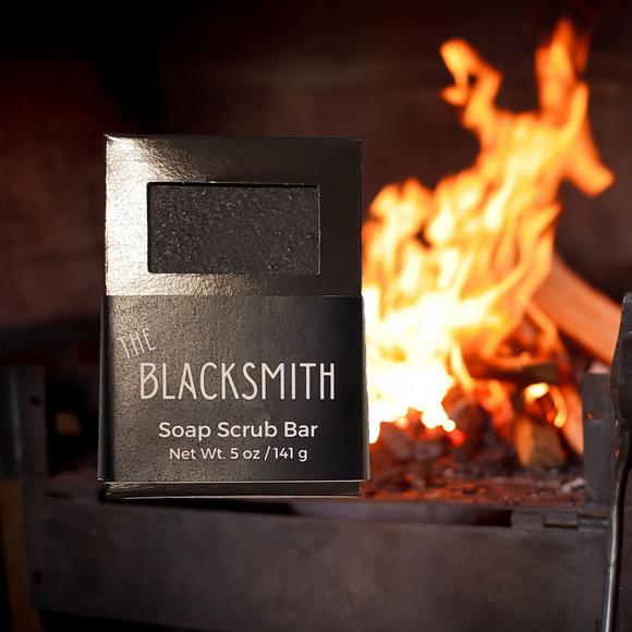 Blacksmith soap scrub bar. Black soap with fire background