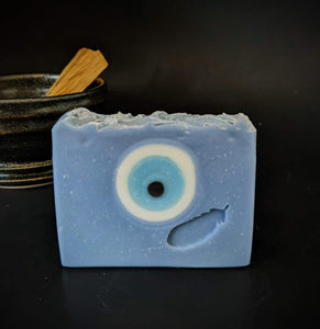 Blue soap with evil eye circle in the middle.