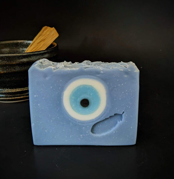 Blue soap with evil eye circle in the middle.