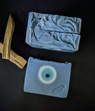 Blue soap with evil eye circle in the middle.