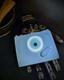 Blue soap with evil eye circle in the middle.